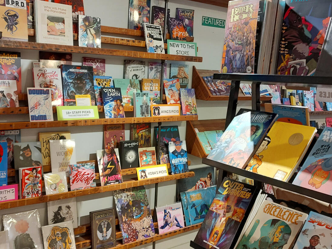 a bamboo cheese plate etched with three tarot cards: wheel of cheese, ace of cheesecutters, and the moon (made of cheese)